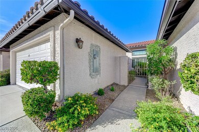 View of side of home featuring stucco siding, an a