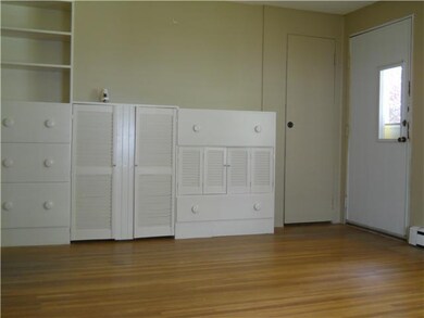 Dining Room. Custom made cabinets and hardwood flo