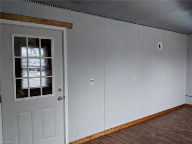 Mud room and entry into kitchen