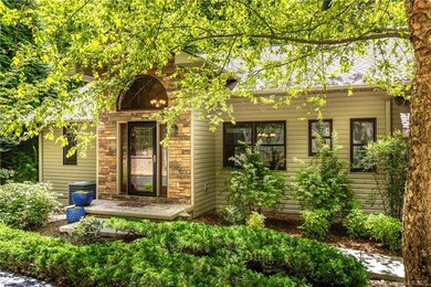 Lush, low maintenance landscaping and a welcoming 
