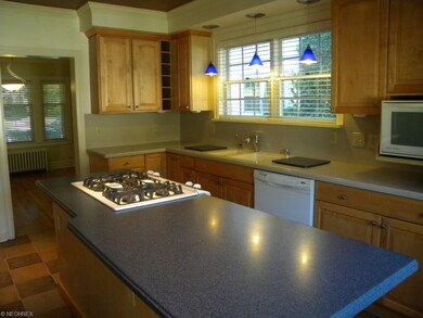 eat-in kitchen with maple cabinets