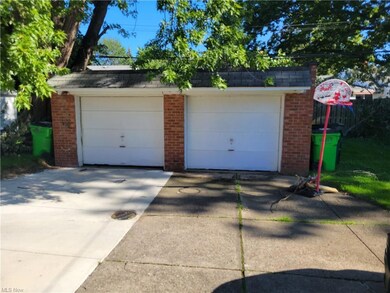 right side garage goes with this property