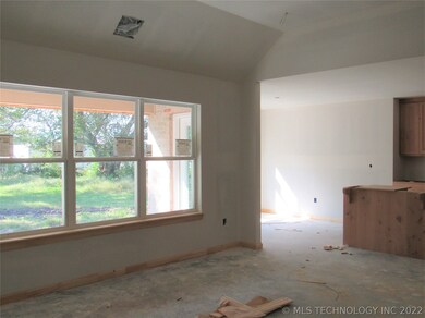 Living room is open to the kitchen and dining room