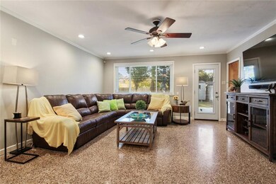 Spacious den with new glass door to your large bac