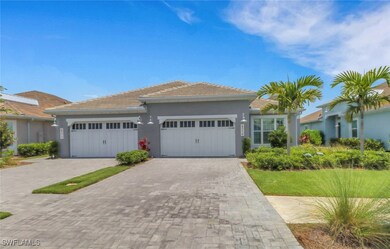 Single story home featuring an attached garage, de