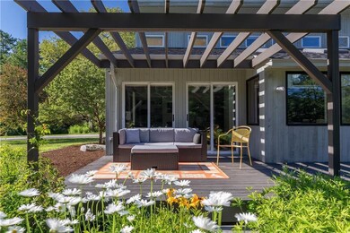 The pergola and deck provide a...