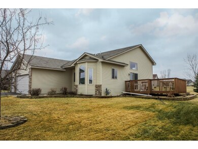Side of home with great deck that overlooks large 