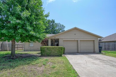 Single story home featuring a front yard