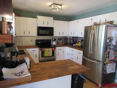 1502 Navajo St, Cortez, CO 81321 - photo 5