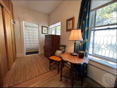 Unit 1 Bedroom with closets on left and bathroom a
