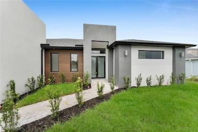 View of front of property featuring a front yard,