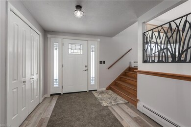 Spacious Foyer area with front Coat closet...wide 
