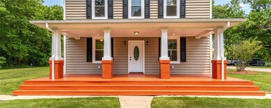 View of front facade with a front yard