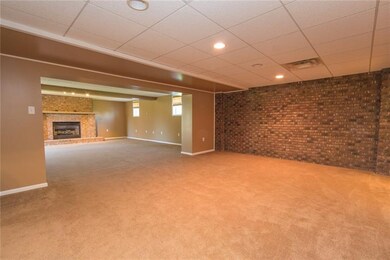 Finished family room or game room on lower level.