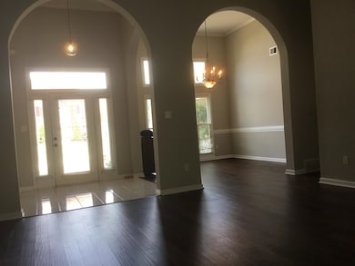 Front door entry with dining room and great room
