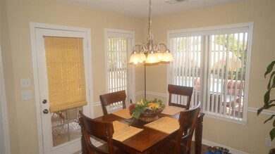 Breakfast Room~View Of The Pool~Tile Floor~Natural