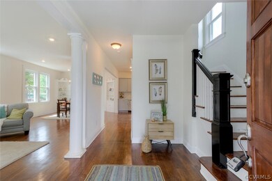 Open Floor Plan with Beautifully refinished Hardwood Floors :)    Inviting Entrance Foyer, Recessed Lighting, and Built Ins - Enhance the Beauty !