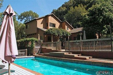 View of back of house from pool.