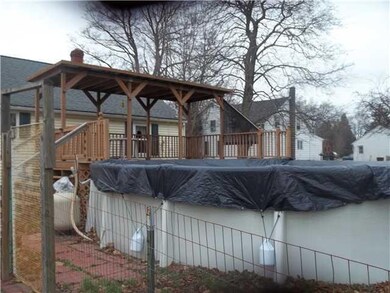 Exterior Back. Pool anddeck and partially fenced.