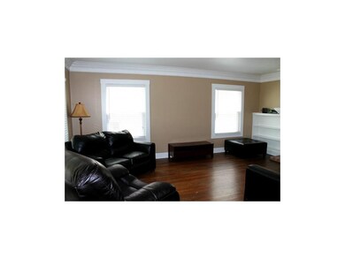 Beautiful hardwood floors and 3 large windows let 