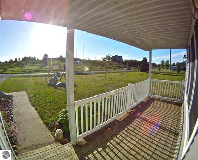 7874 E Longbranch Cir, Traverse City, MI 49684 - photo 6