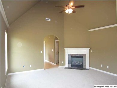 Greatroom offers vaulted ceilings...