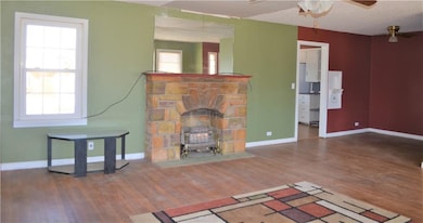 LARGE Living Room and a LOVELY FIREPLACE !