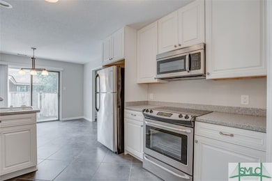 Eat-in Kitchen with stainless appliances