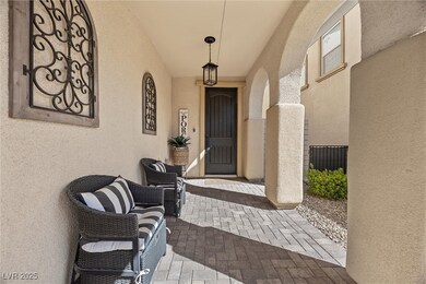 Entrance to property with stucco siding