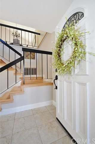 Warm and Welcoming Front Entry Invites Guests into