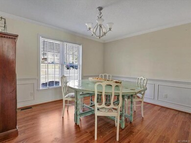 Dining Room with new wood laminate floors, picture