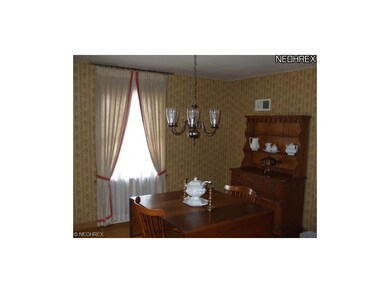 Nice formal dining room with hardwood floors.