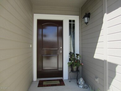 Welcoming Front Door and Covered Entry