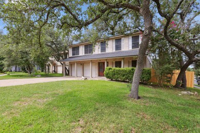 View of front facade featuring concrete driveway 