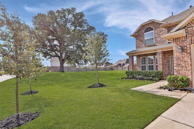 Alternate view looking towards the open green space next to the house.