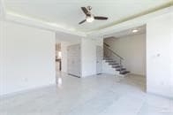 Empty room featuring ceiling fan