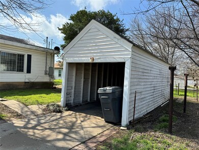 Detached garage with power & additional storage in