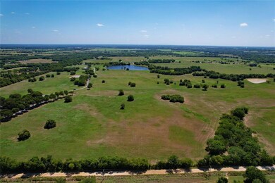 Bird's eye view featuring a water view and a rural