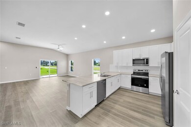 Kitchen featuring appliances with stainless steel