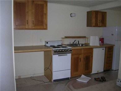 Kitchen. REAR APARTMENT/NEW CARPET