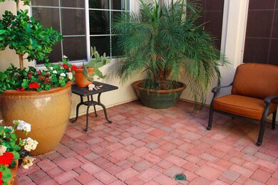 Beautiful pavered front courtyard.