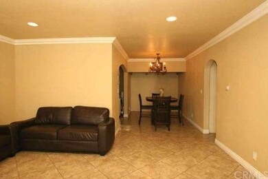 Features recessed lighting & elegant crown molding