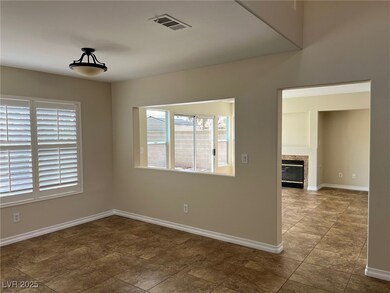 Empty room with a wealth of natural light, baseboa