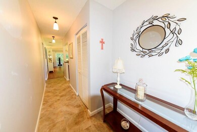 Enter the home through this spotless hallway