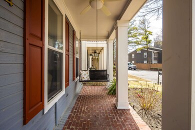 View of patio with covered porch and ceiling fan