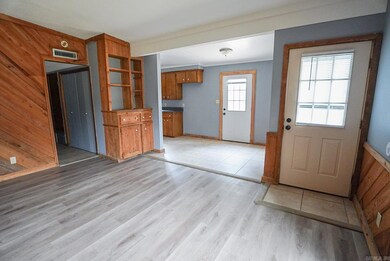 View from living room to front entry