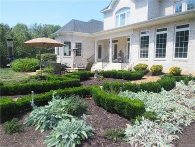 Rear of all brick home, close to house.