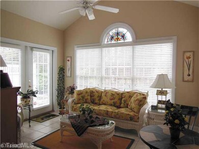 Sunroom. Open & Bright Sunroom with tile flooring - Perfect for relaxing or reading!