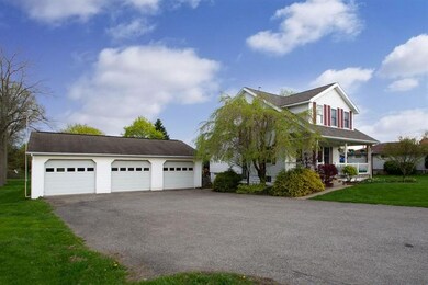 Three car detached garage with room for storage. T