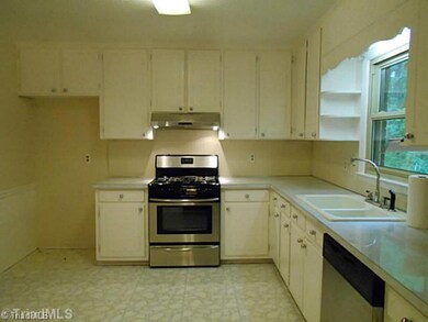 Kitchen. Kitchen has tons and tons of cabinet space for all of your storage needs, as well as updated appliances.